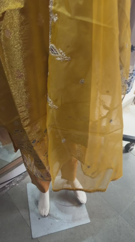 Mustard yellow shimar cotton. With pant or dupatta and thread work neck , sleeves